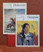 Two vintage art books from The Masters series featuring Delacroix and Gauguin on the covers.