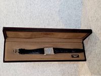 Vintage Seiko Lasalle wristwatch in its original box, showing full watch and strap.