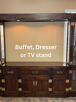 Front view of piece fitted under wall unit surround