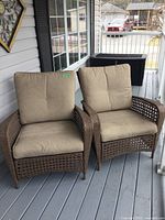Both chairs side by side on porch
