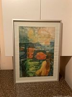 Frontal photo of the framed watercolor painting showing its colors and abstract shapes