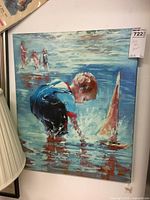 Frontal image of the oil painting showing the young boy playing at the beach with a toy sailboat in shallow water reflecting the colors of the scene, with other figures faintly in the background.