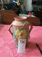 Full view of the Roseville Peony vase showing shape, color, and handles