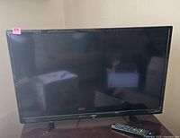 31-inch Sanyo flat-screen television on stand with black frame and visible Sanyo logo.