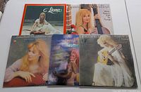 Five Liona Boyd LP album covers showing portraits and artistic images of Liona Boyd with guitar