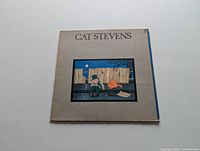 Front cover of Cat Stevens LP album showing man and cat illustration.