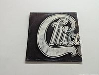 Front cover of Chicago LP record with black design and large stylized band name.