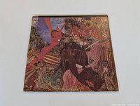 Front cover of Santana 'Abraxas' album showing colorful and detailed artwork with visible wear.