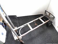 Metal frame of Gemini hand cart showing convertible feature and wheels