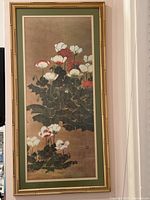 Full view of the vintage Japanese floral print framed with bamboo-style edging and green mat