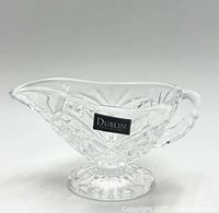 Side view of Godinger Dublin Collection 24% lead crystal glass creamer with visible label