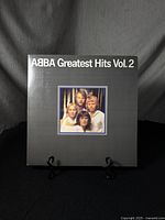 Front of ABBA Greatest Hits Vol. 2 vinyl record cover showing group photo of ABBA.