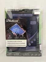 Front view of the Blackboard Boogie Board in original packaging showing the reusable writing surface and product branding.