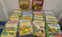 Photo showing all 18 Franklin the Turtle books arranged on table, titles visible including Franklin's Baby Sister, Valentines, Goes to Day Camp, and others.