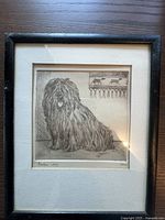 Front view of framed signed dog etching with date 1977 and artist signature 'Rabin'.