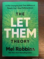 Front cover of the book with title 'The Let Them Theory' by Mel Robbins