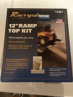 Photo of original boxed Reese 12" Ramp Top Kit Model 11007 showing 700 lb capacity per ramp and usage with 2x12 boards.