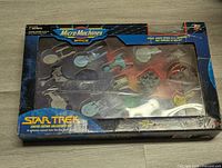 Photo of Star Trek Micro Machines Limited Edition Collector's Set in opened box with visible miniature ships.