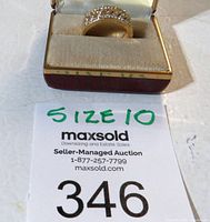 Ring displayed in original box with size 10 indicated on auction tag.