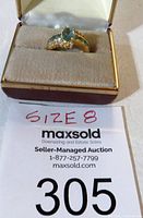 Ring in suede jewelry box showing size 8 marking on note
