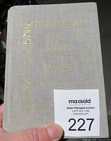 Front cover of the book showing title "The Book of Runes" by Ralph H. Blum in faded gold lettering on grey cloth hardcover.