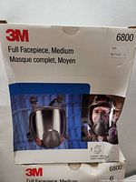 Box of 3M 6800 Full Facepiece Medium size respirator showing branding and product image.