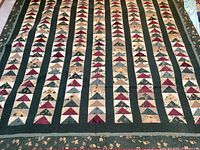 Full view of quilt laid flat showing overall pattern