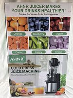 Front and side views of AHNR cold press juice machine box, featuring images of fruits and juices it can make including orange, blueberry, apple, carrot, celery, and onion