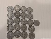 Top side view of all 21 coins showing the obverse (portrait of King George VI)