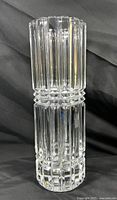 Full view of vintage Cristal D'Arques crystal vase showing vertical fluted design with faceted ring detail.
