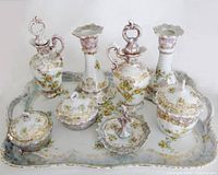 Full dresser set on tray showing all included porcelain pieces with floral and gold decoration