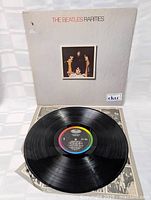 Vinyl record on inner sleeve showing Capitol label with colorful trim, demonstrating good vinyl condition.
