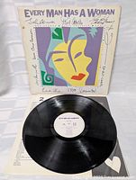 Full vinyl record and inner label showing the LP in good condition