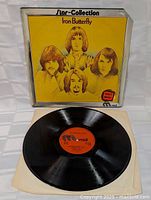 Front view of Iron Butterfly Star Collection vinyl LP record with cover and vinyl shown.