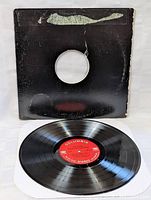 Vinyl LP record out of sleeve showing black Columbia label and minimal surface wear.