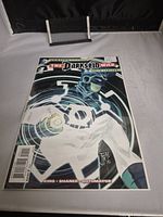 Photo of the comic book Justice League: The Darkseid War #1 showing the front cover and artwork especially highlighting Green Lantern.