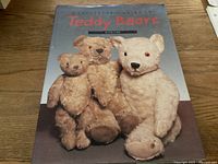 Front cover of the book showing the title and three vintage teddy bears on a soft gray-beige background.