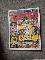 Front cover of The Penguin Book of Comics showing colorful comic characters and title