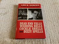 Front cover of the book showing title, author name, and photos.