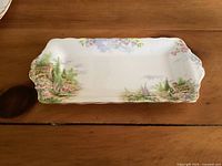 Top view of the rectangular sandwich tray showing the Kentish Rockery scenic floral pattern on a rectangular plate with scalloped edges.