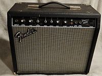 Front view of black Fender Frontman 25R guitar amplifier showing control panel and grille cloth.