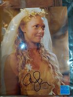 Front view of the autographed Amanda Seyfried Mama Mia photograph showing signature and COA sticker.