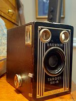 Front angle of the Kodak Brownie Target Six-16 camera showing the lens and side viewfinder window