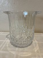 Front view showing the crystal cut pattern and handles of the wine/ice bucket