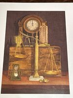 Close-up of watercolour painting showing scales of justice, hourglass, clock, and mortar with clear signature of artist Antaya at lower right.