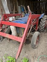 Front view showing loader frame attached to tractor chassis