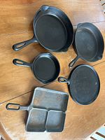 Overhead view of all five cast iron pieces laid out