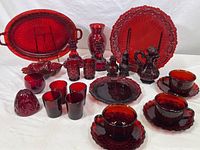 Full lot arranged with all ruby red glass items identified and displayed.