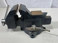 Side profile showing overall vise with the jaw width "4 1/2" clearly stamped and "Made in USA" visible.