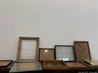 All frames displayed leaning and lying on tabletop
